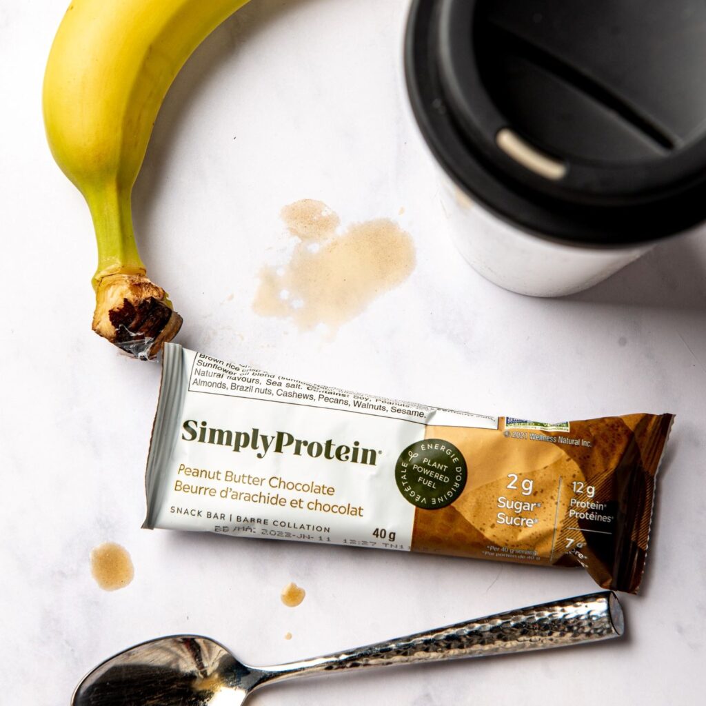 Simply Protein granola bar, banana, and coffee. 